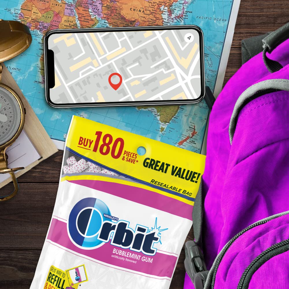 Orbit Bubblemint bag beside car keys on desk