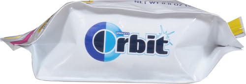 Hand reaches for Orbit Bubblemint on a desk