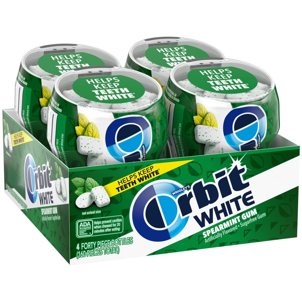 Orbit White Spearmint gum bottle on a desk for long-lasting fresh breath.
