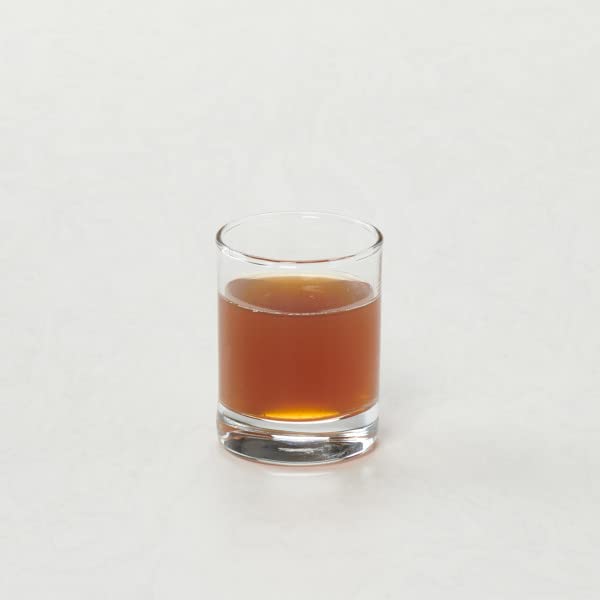 Hot vanilla chai latte assembled from concentrate and milk with a cozy aroma.