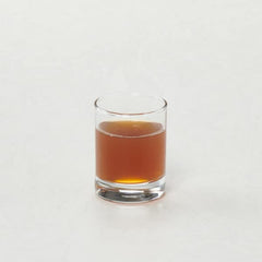Hot vanilla chai latte assembled from concentrate and milk with a cozy aroma.
