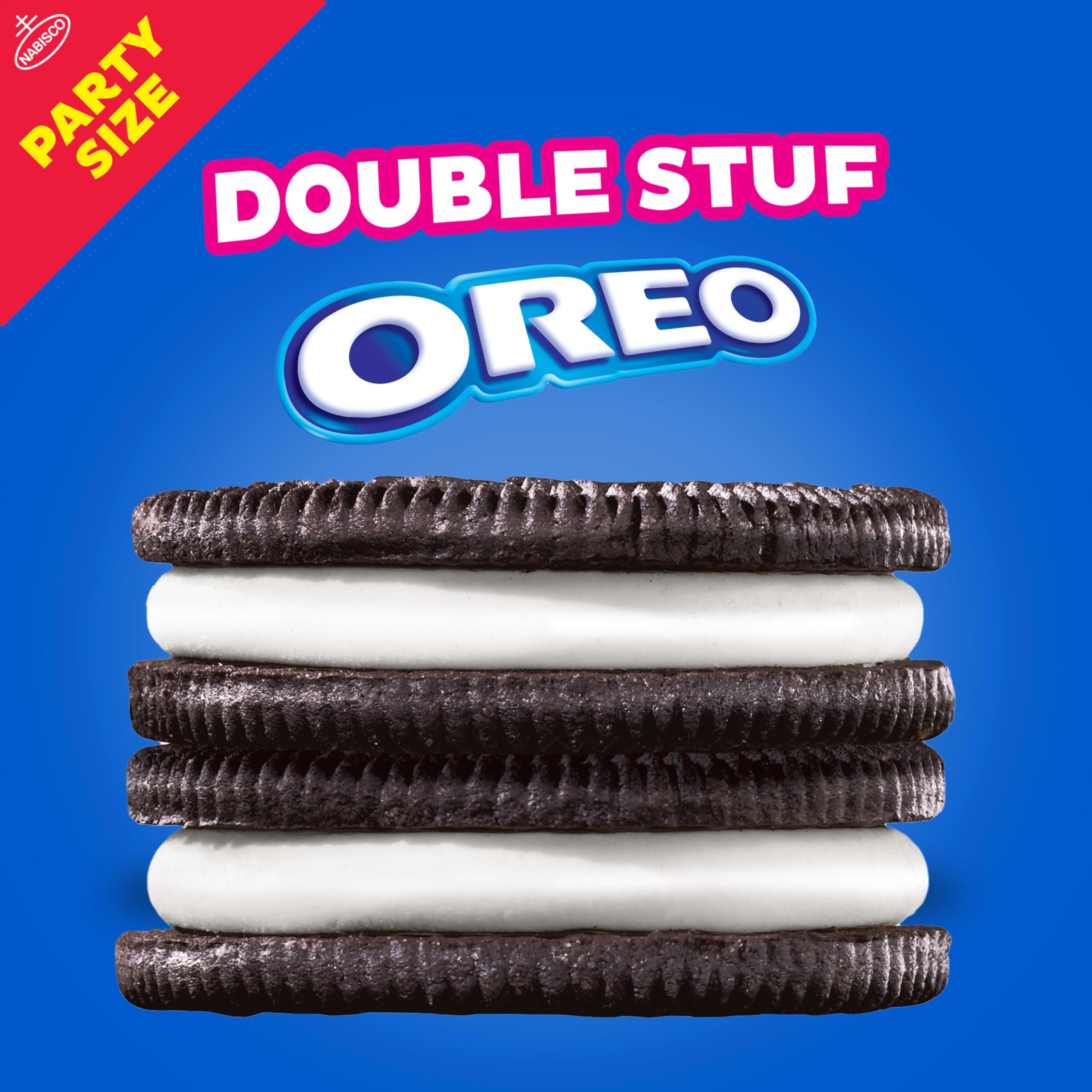 OREO Double Stuf cookies dunked in milk in a glass.