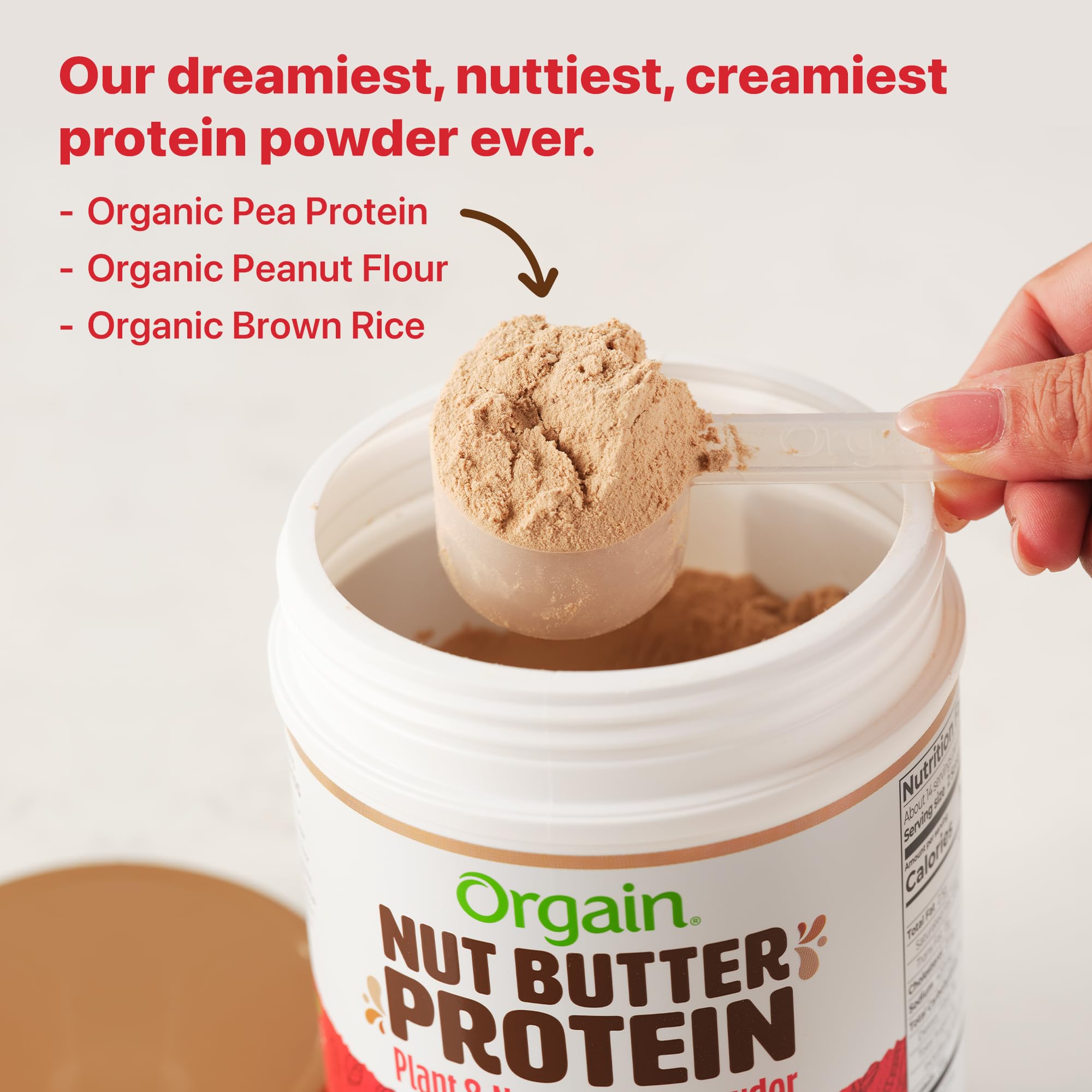 Orgain Nut Butter Protein Powder swirled in bowl with chocolate peanut butter ribbon.