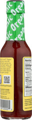 Close-up of Organic Harvest Jalapeño Sauce label highlighting gluten free and organic certification.