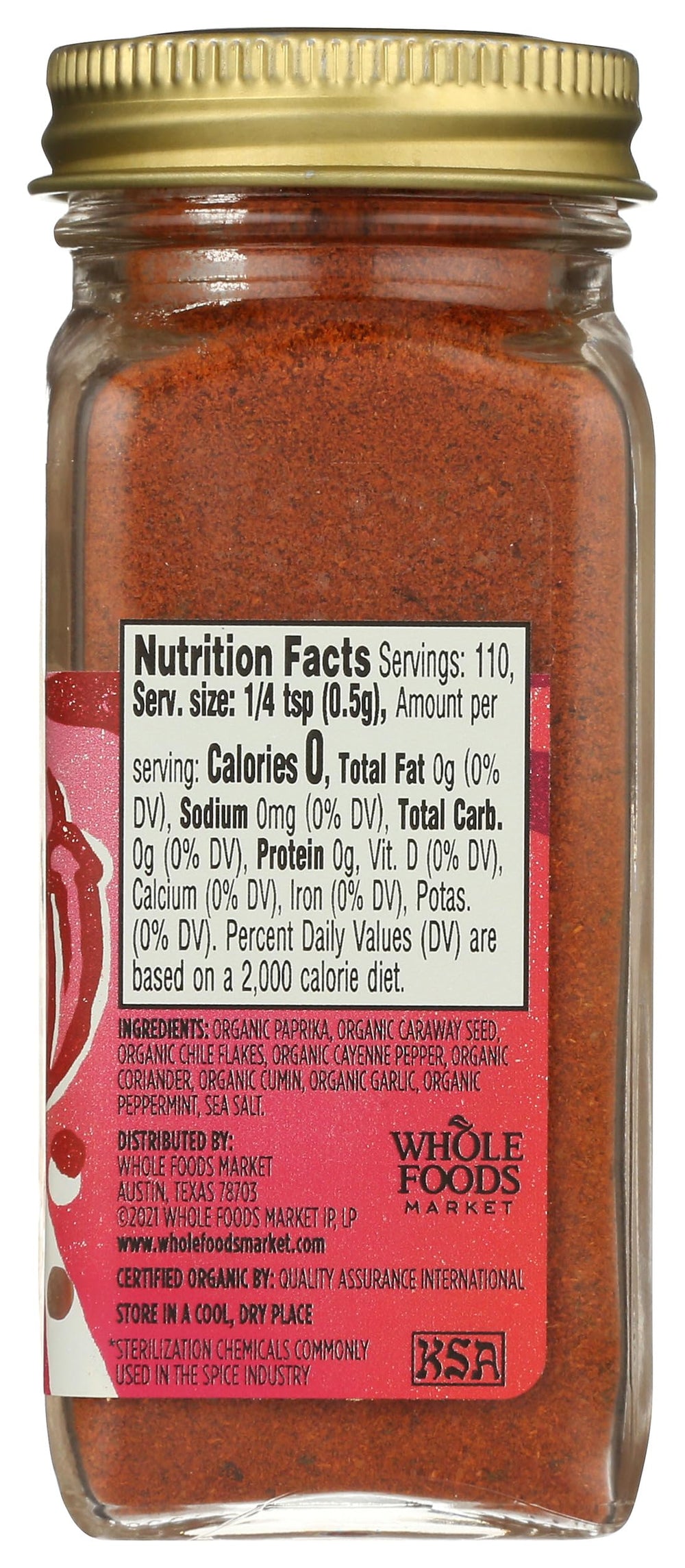 Organic, kosher-certified harissa spice in recyclable glass jar.