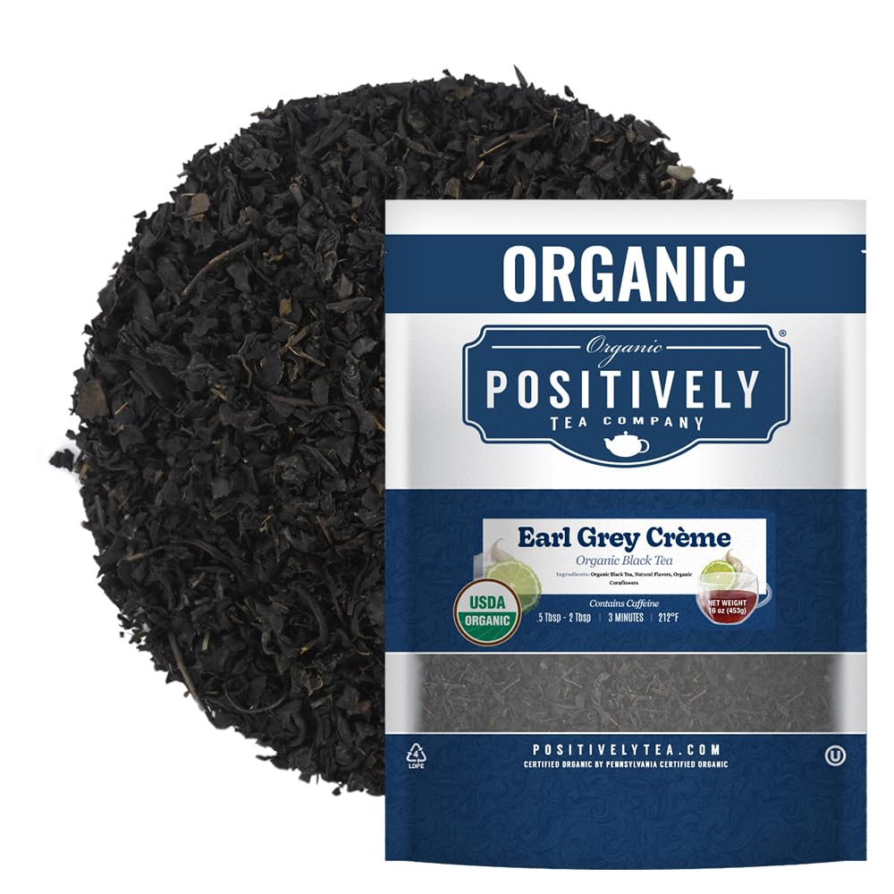 Organic Positively Tea Company Earl Grey Creme loose-leaf tea in a jar for fresh brewing.