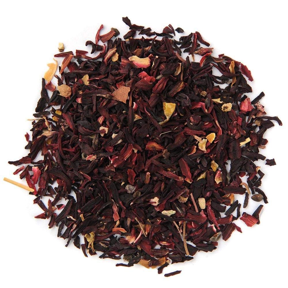 Organic Positively Hibiscus Tea red liquor in glass