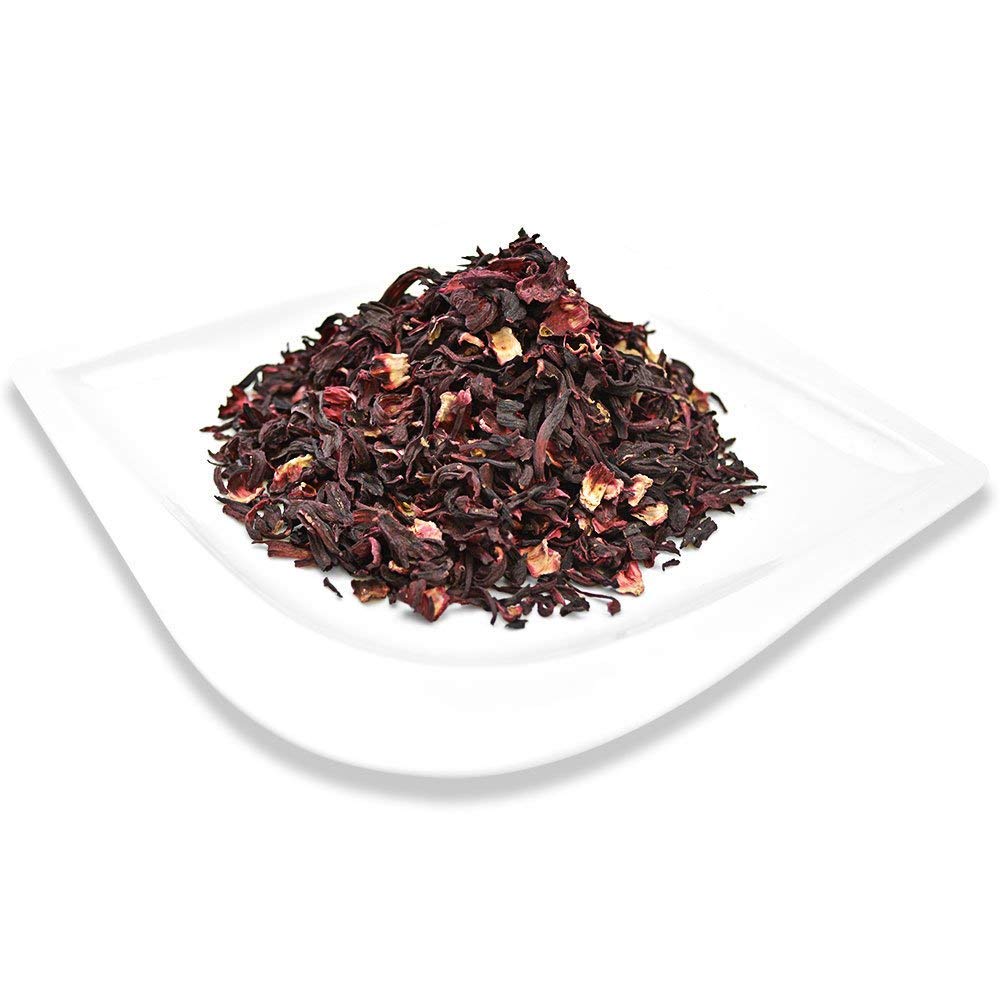 Organic Positively Hibiscus Tea steeped in pot ready to pour