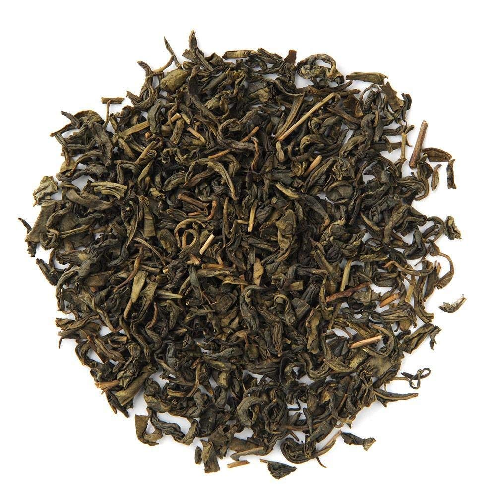 Organic Positively Tea Company Jasmine Green Tea kitchen scene ready to brew.
