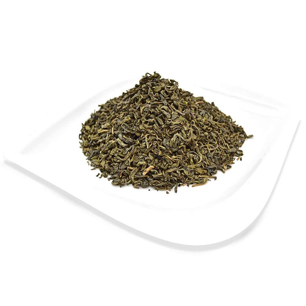Organic Positively Tea Company Jasmine Green Tea measuring spoon enables precise brew.