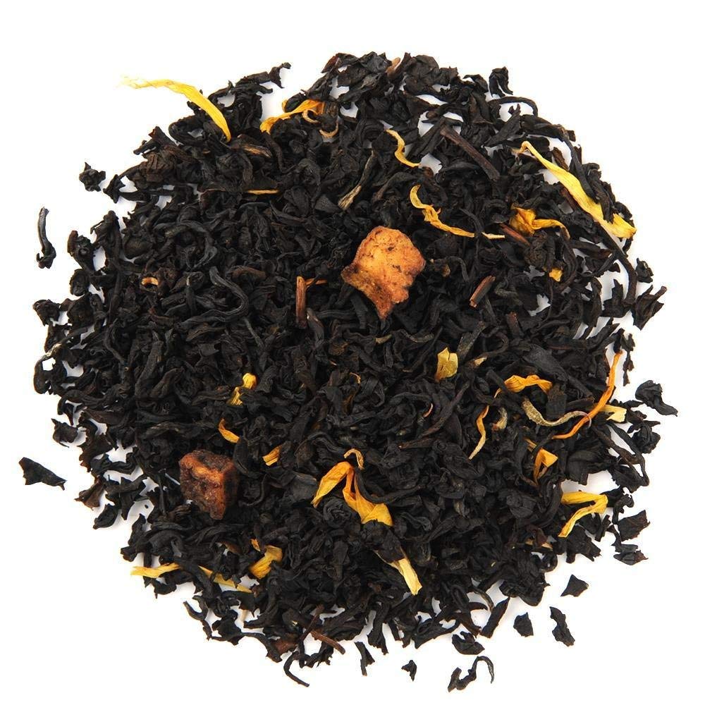 Organic Positively Tea Juicy Peach Black Tea brewed cup with bright peach aroma