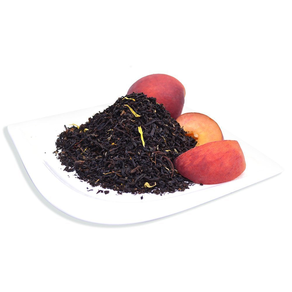 Organic Positively Tea Juicy Peach Black Tea color infusion emphasizing fruity flavor