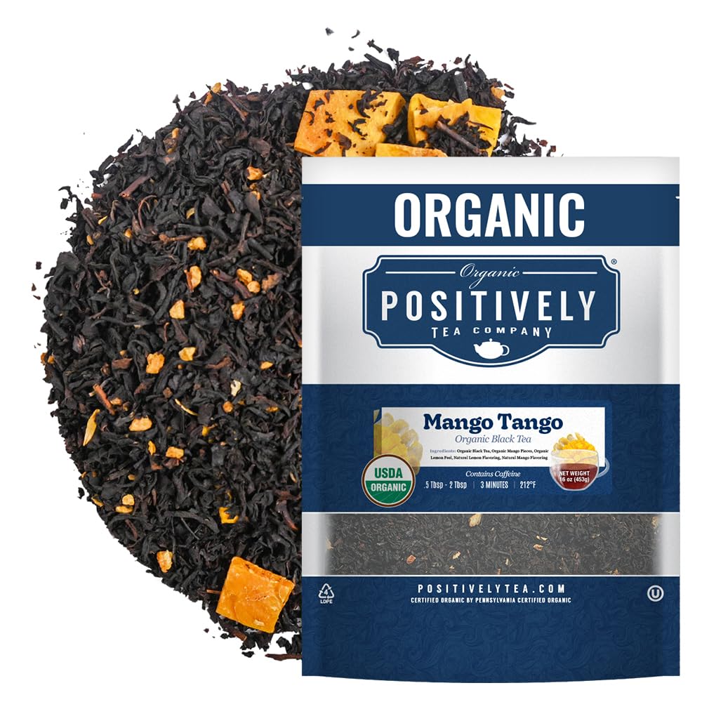 Organic Positively Mango Tango tea leaves closeup, ideal for a bright citrus-forward brew.
