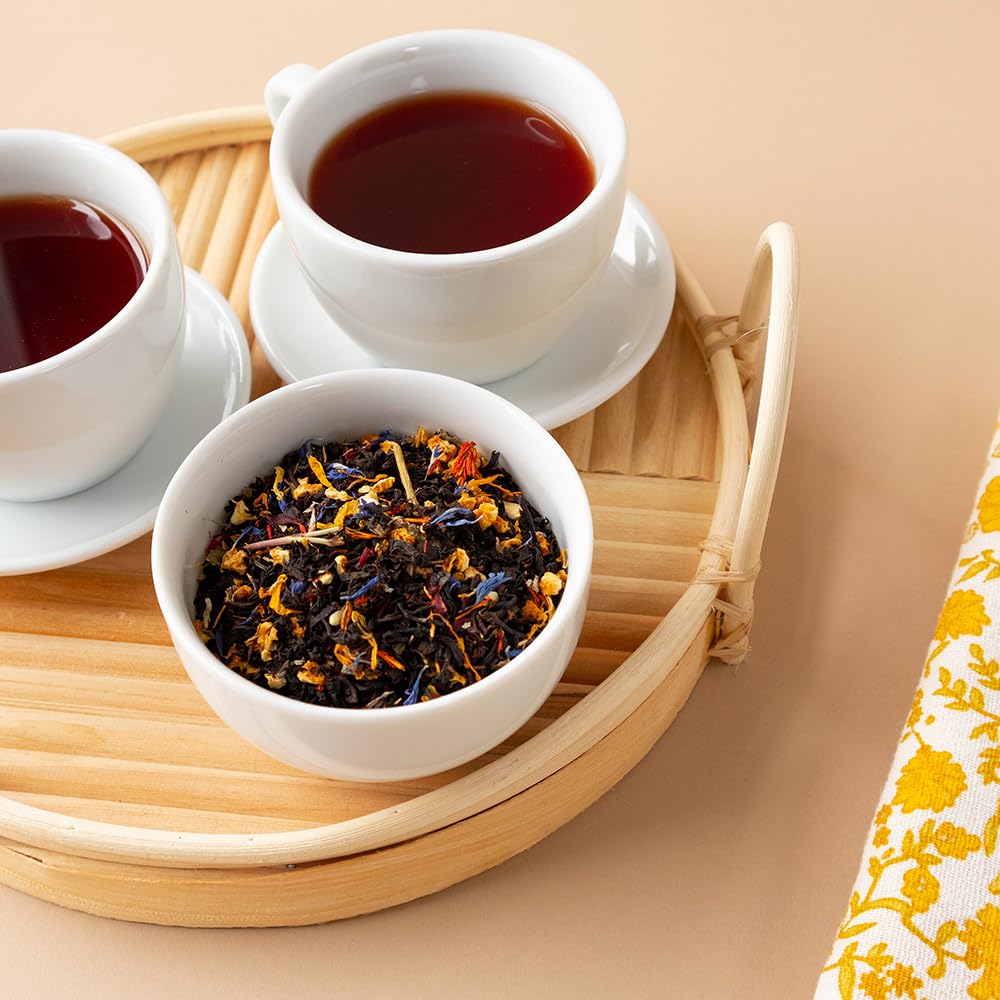 Warm cup of Paradise Black Tea lifting a mid-afternoon moment