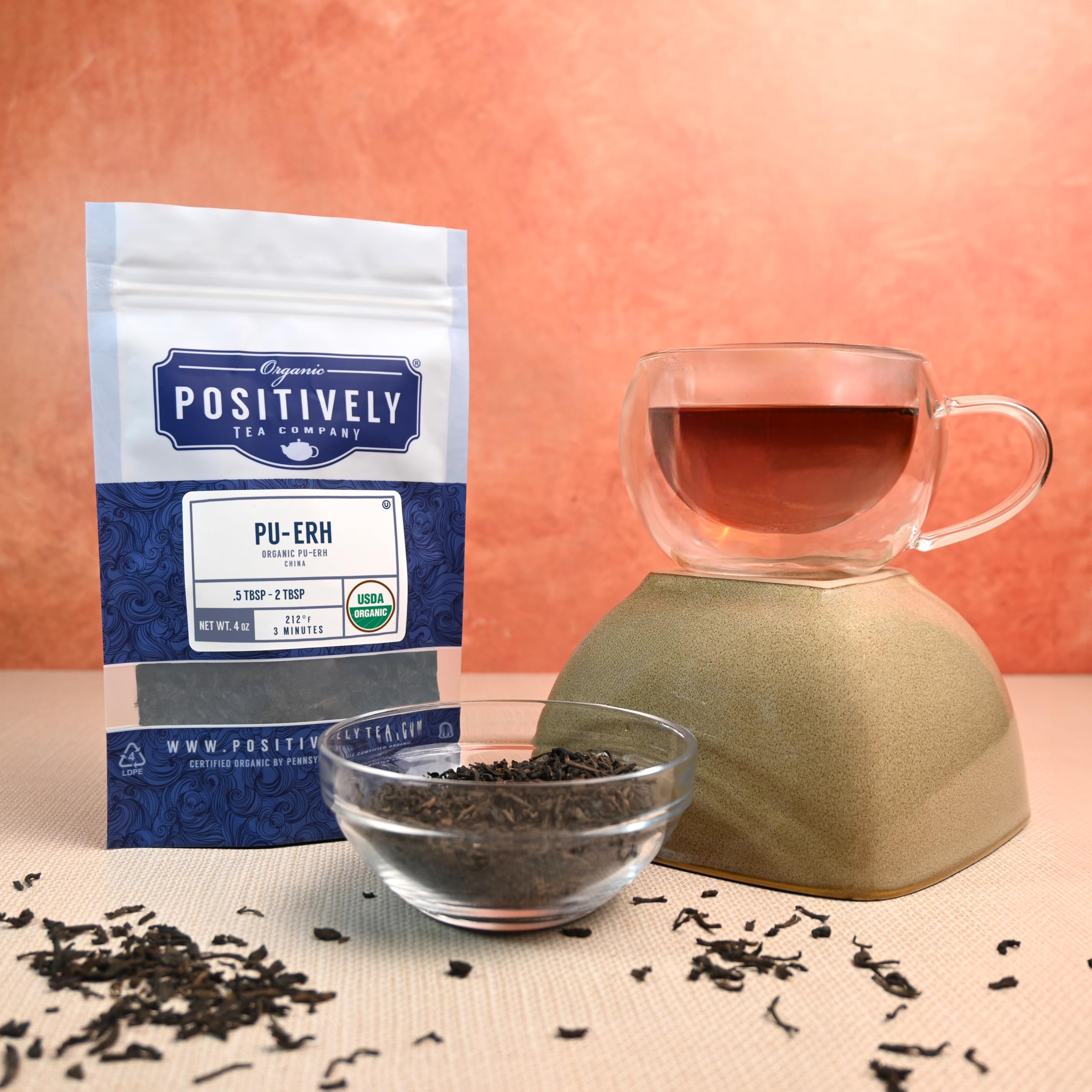 Organic Positively Tea Pu-Erh dry leaves bulk image emphasizes natural quality.
