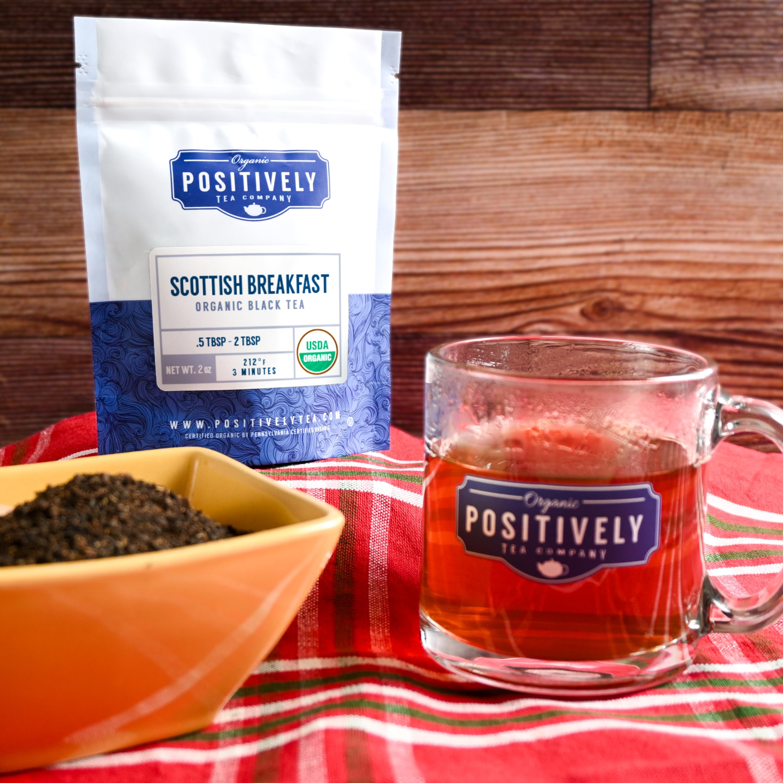 Milk being poured into Organic Positively Tea Company Scottish Breakfast cup