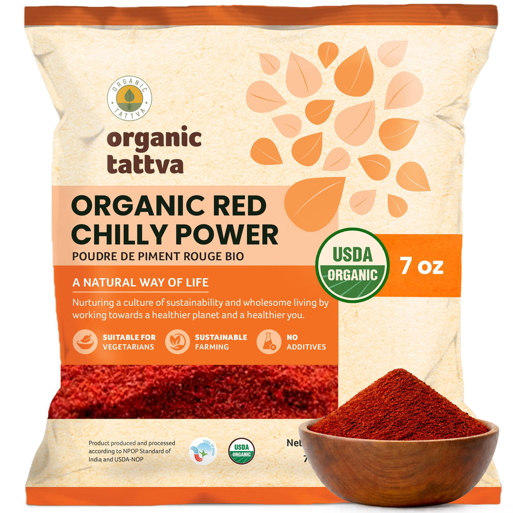 Organic Tattva Red Chili Powder in a jar shows vibrant color and fresh aroma.