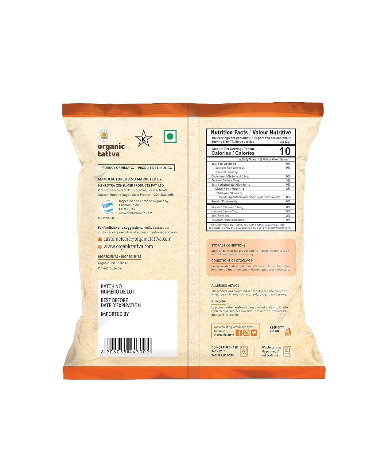 Organic Tattva Red Chili Powder being poured to add aroma to a dish.