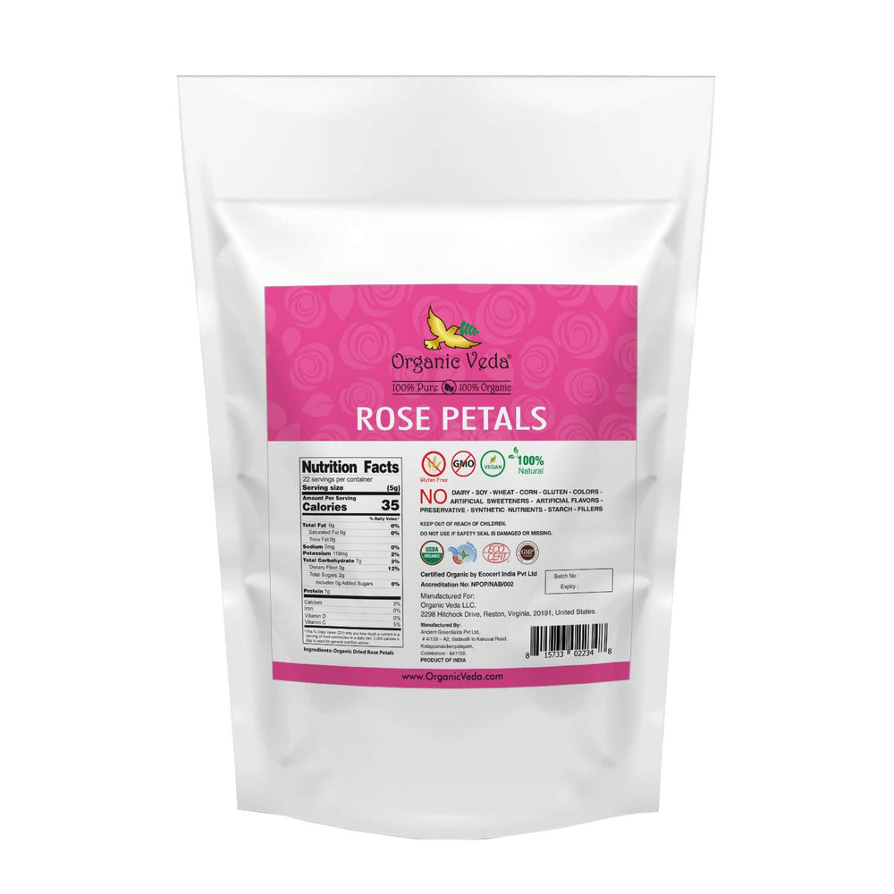 Organic Veda dried rose petals steeping in hot water for fragrant tea.