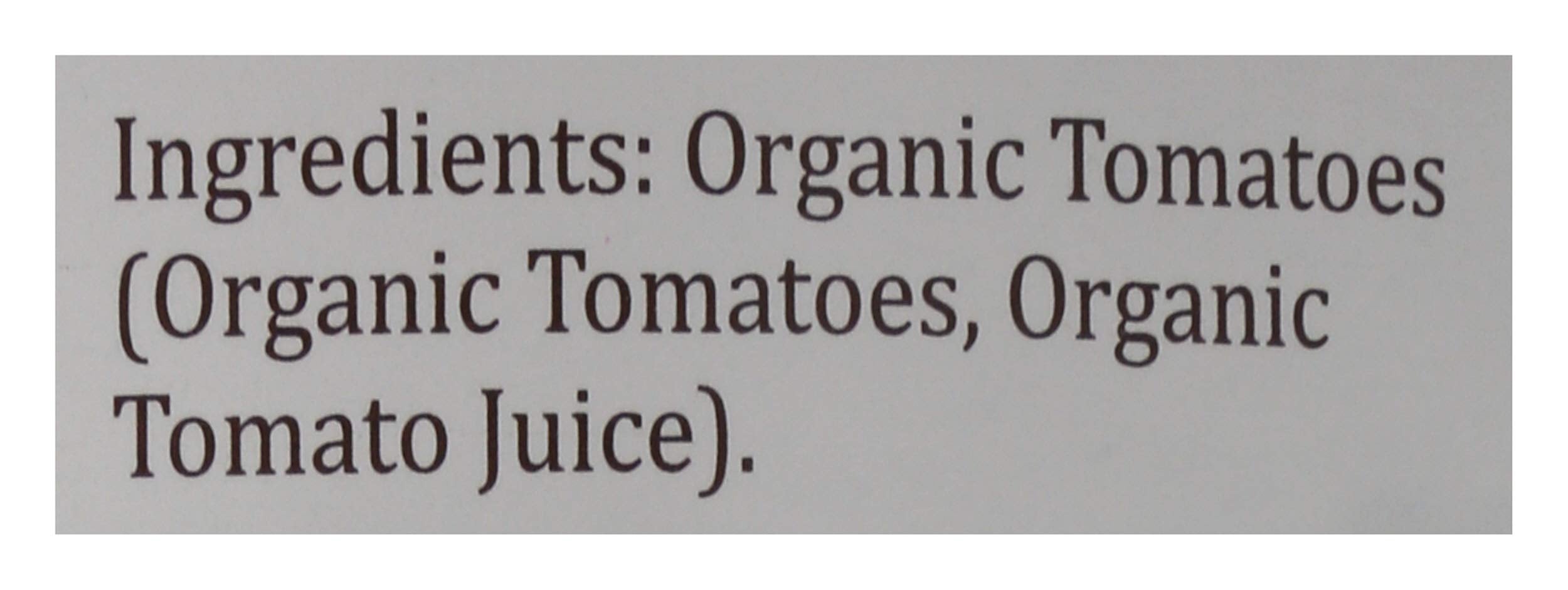 Organico Bello organic whole tomatoes simmering into sauce on stove.