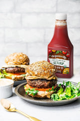 Organicville Organic Ketchup with burgers and fries; convenient squeeze topping