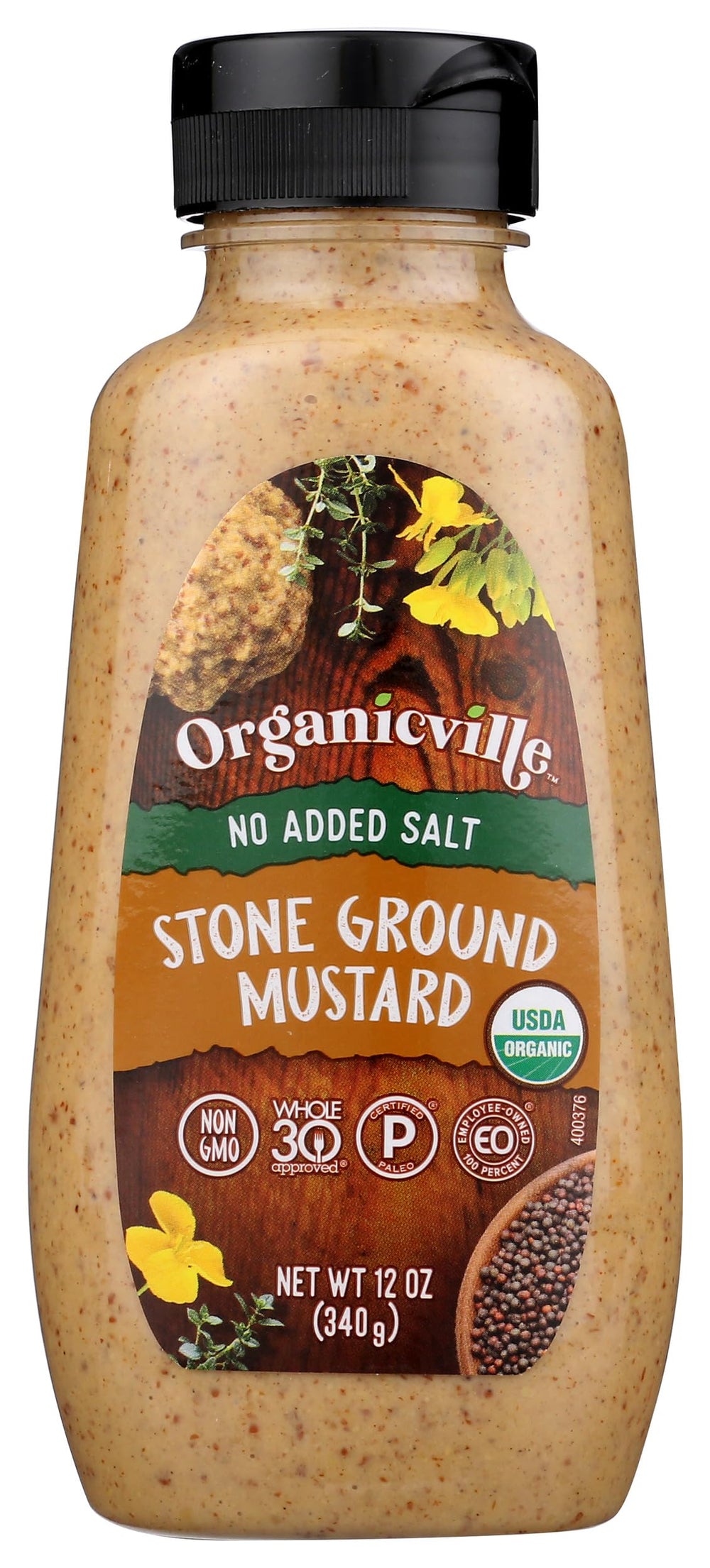 Organicville salt-free mustard bottle on counter, ideal for sandwiches.
