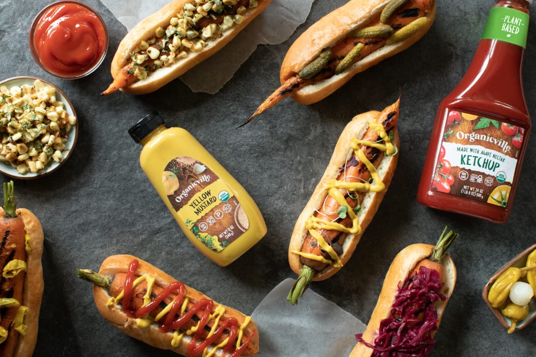 Dipping Organicville Mustard in a small bowl for versatile snacking
