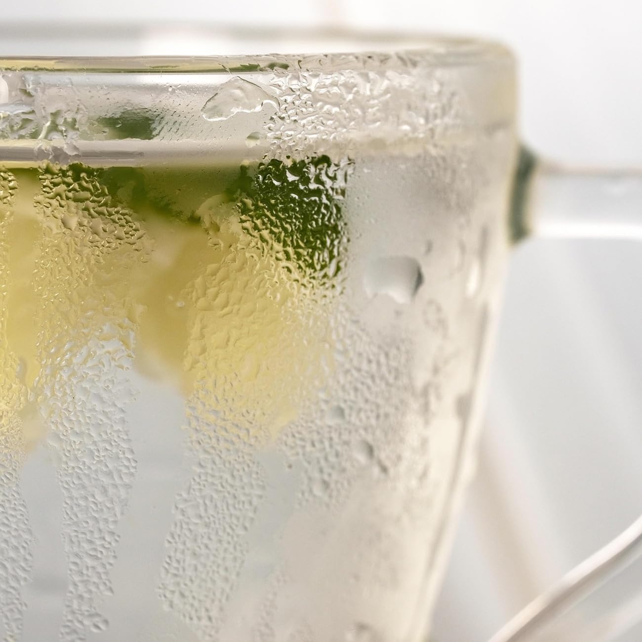 Orgnisulmte lemon powder smoothie shot emphasizes quick flavor boost.