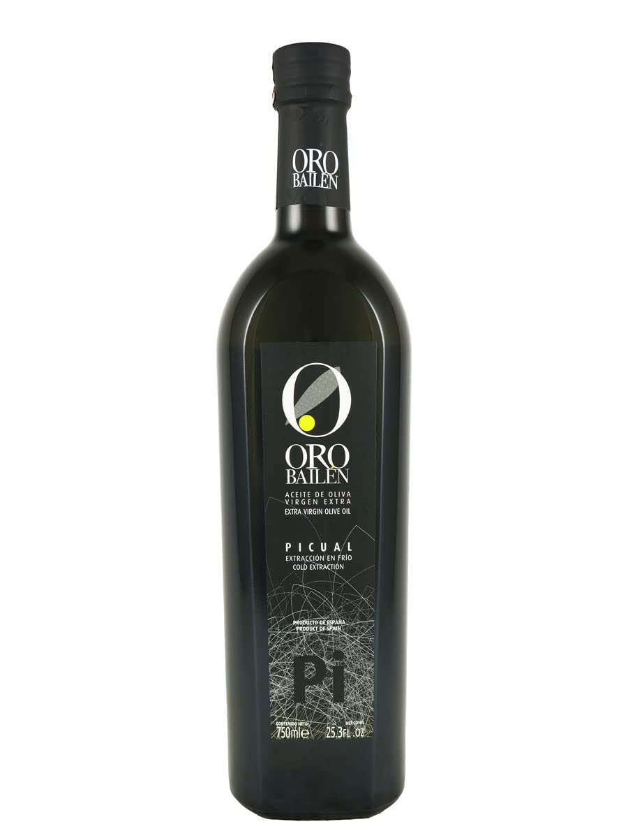 Oro Bailen Reserva Familiar Picual 2020 bottle pour – rich fruity oil for dipping and finishing.