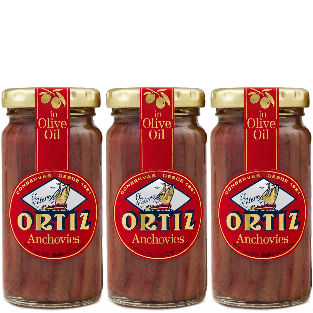 Ortiz anchovies in olive oil in a glass jar showing premium packaging and flavor.