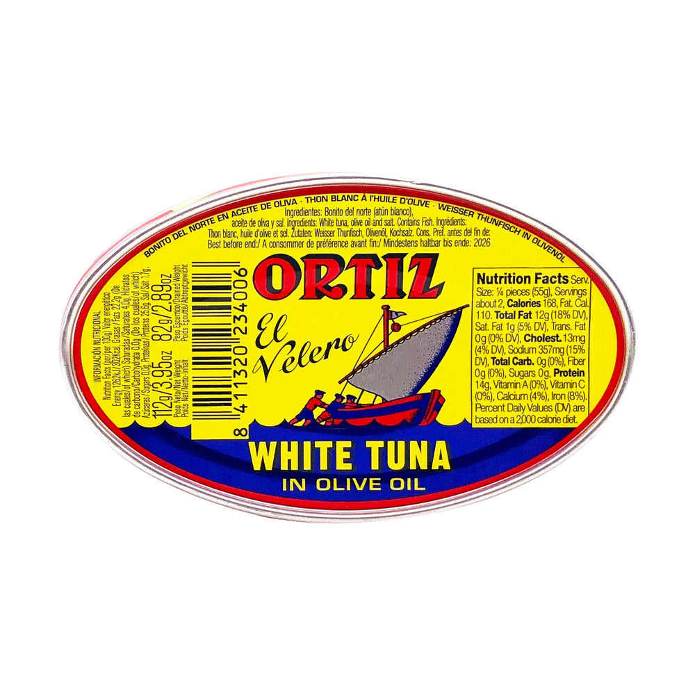 Ortiz white tuna texture close-up, moist and flaky.