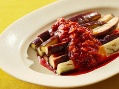 OSK S&B chili oil with crunchy garlic topping enhances rice with flavor