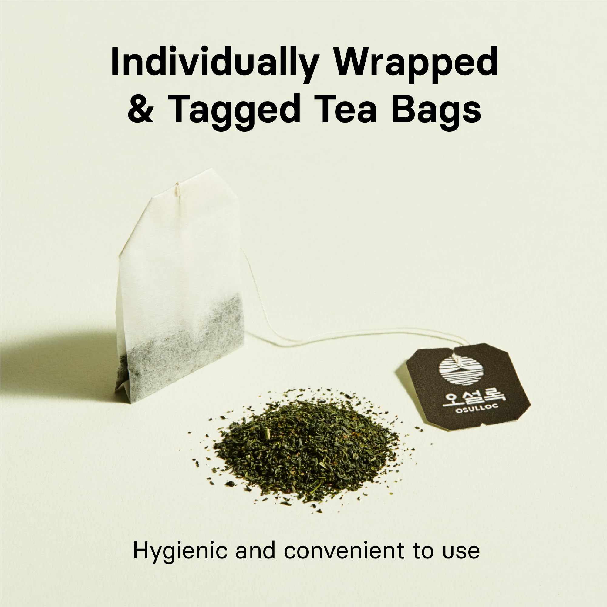 Osulloc tea bag dip in hot water illustrates quick-brew convenience.