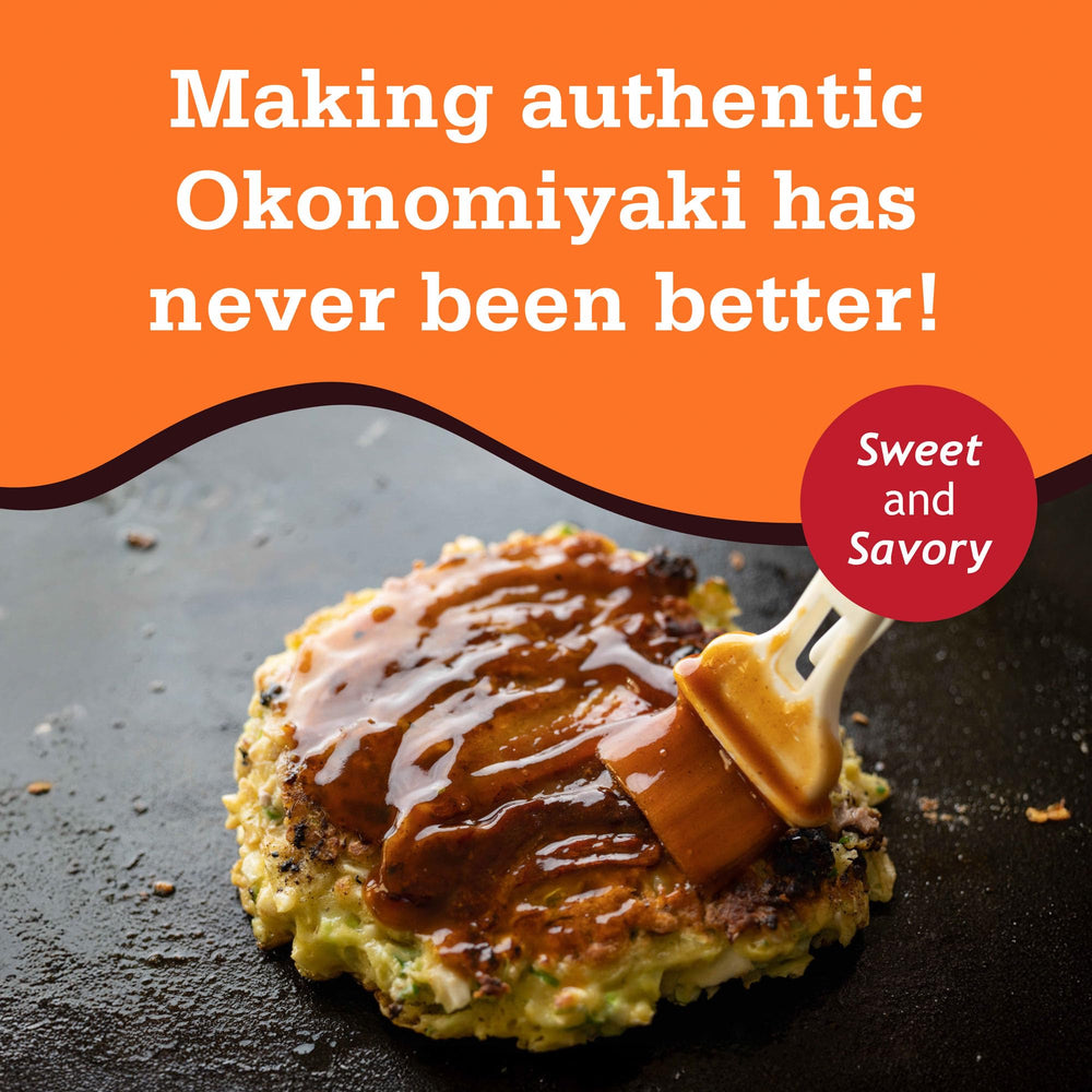 Prepared okonomiyaki with sauce and flour, ready to serve.