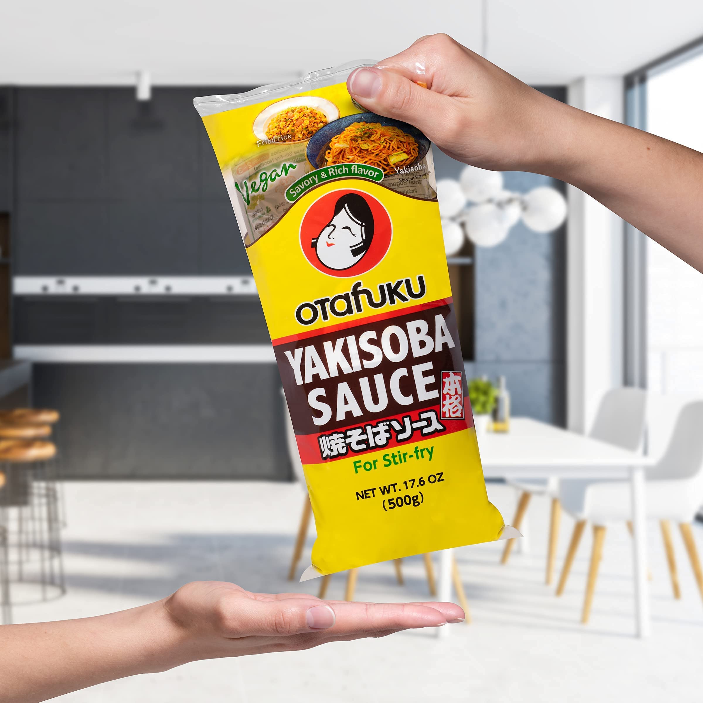 Otafuku Yakisoba Sauce ready-to-use glaze over sizzling vegetables and noodles.