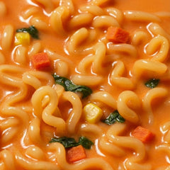 OTOKI Cheesy Ramen bowl steaming evokes comforting, creamy spice in a ready-to-eat moment.