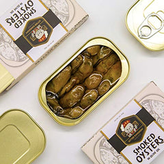 Otter Kingdom smoked oysters in olive oil tin close-up, highlighting rich color and glossy oil.