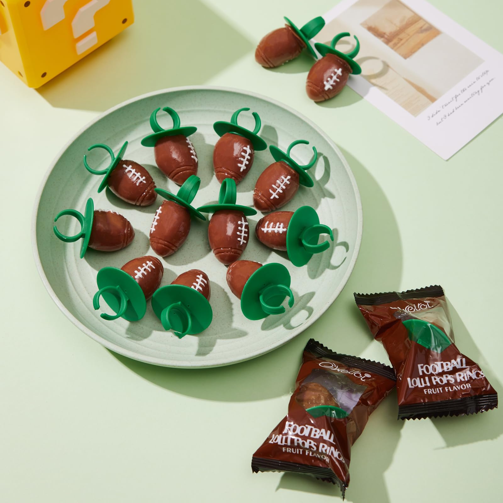 Oweiroi football ring lollipops grape flavor offers tasty sweetness.