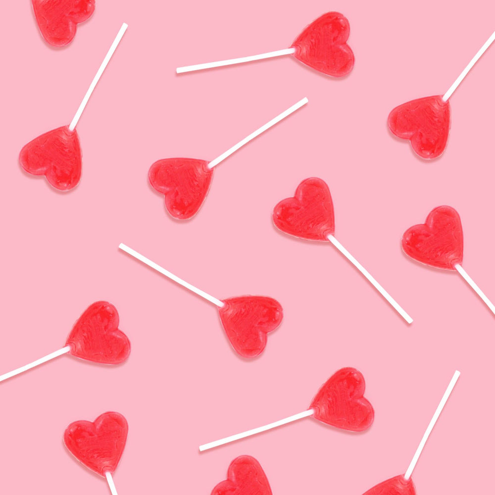 Oweiroi Valentines foil-wrapped lollipops, ideal party favors.