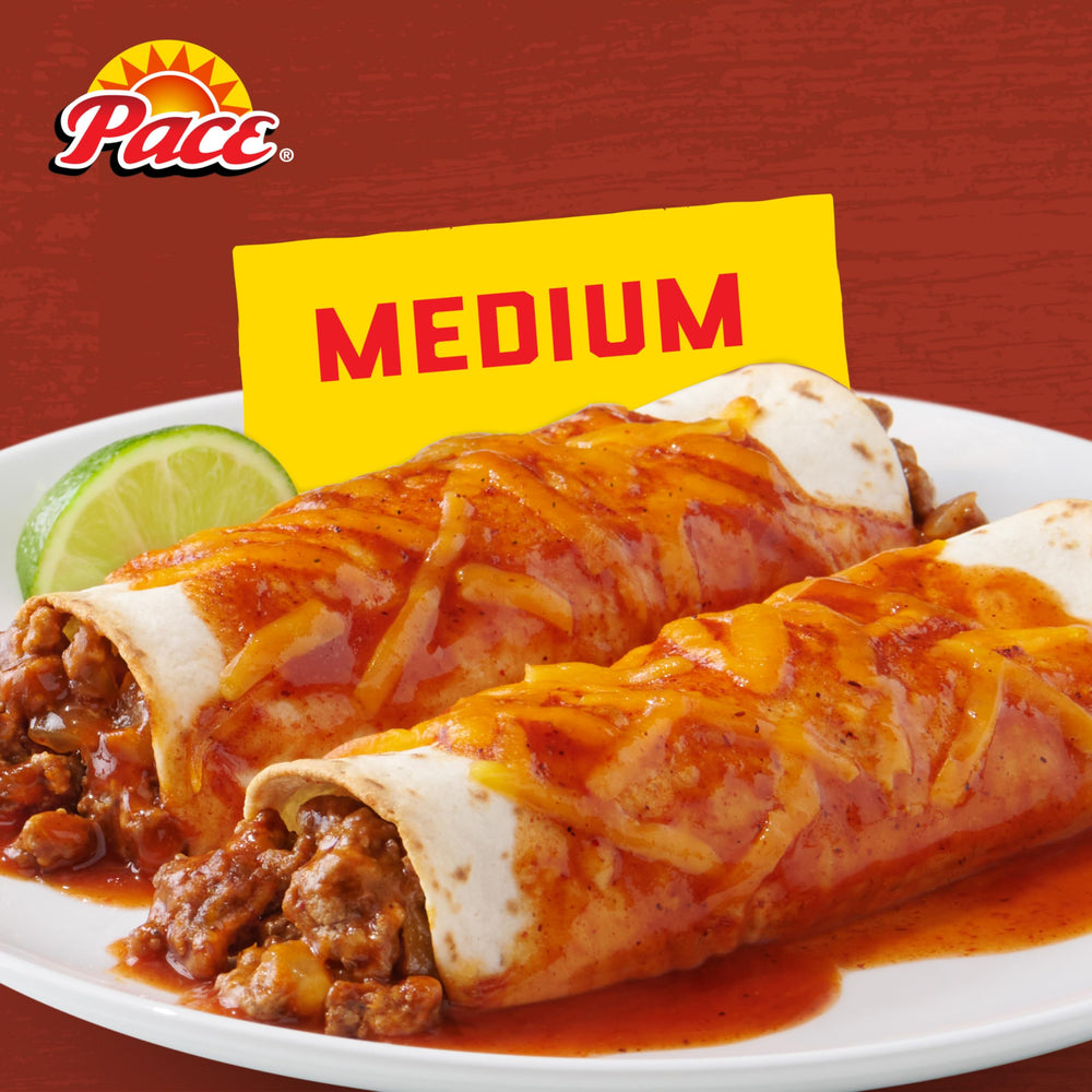 Pace Medium Red Enchilada Sauce simmering in pan, great for enchiladas and soups
