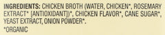 Pouring Pacific Foods chicken broth into a pot for base flavor