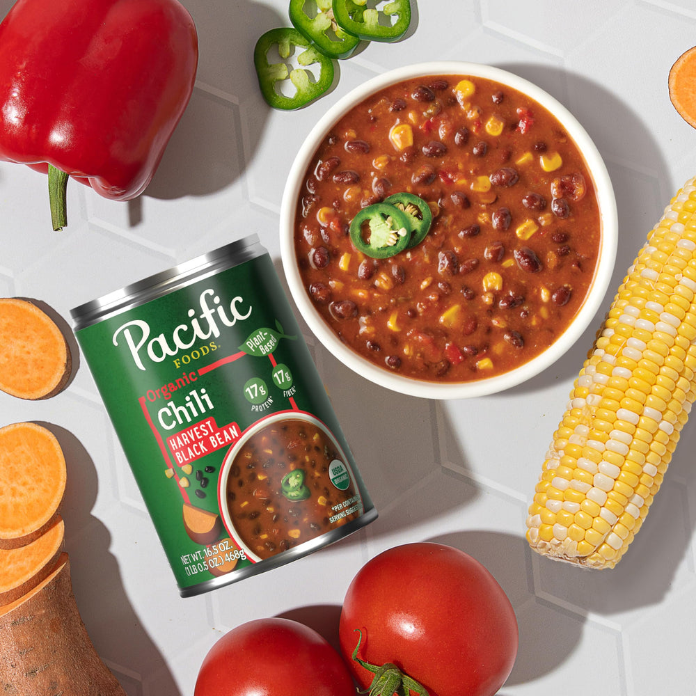 Plate of Pacific Foods Harvest Black Bean Chili with toppings for a versatile dish.