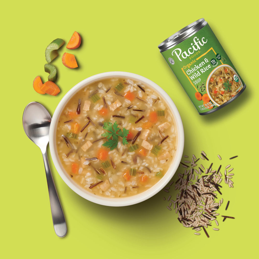 Pacific Foods soup being poured into a pan, easy heating for quick meals