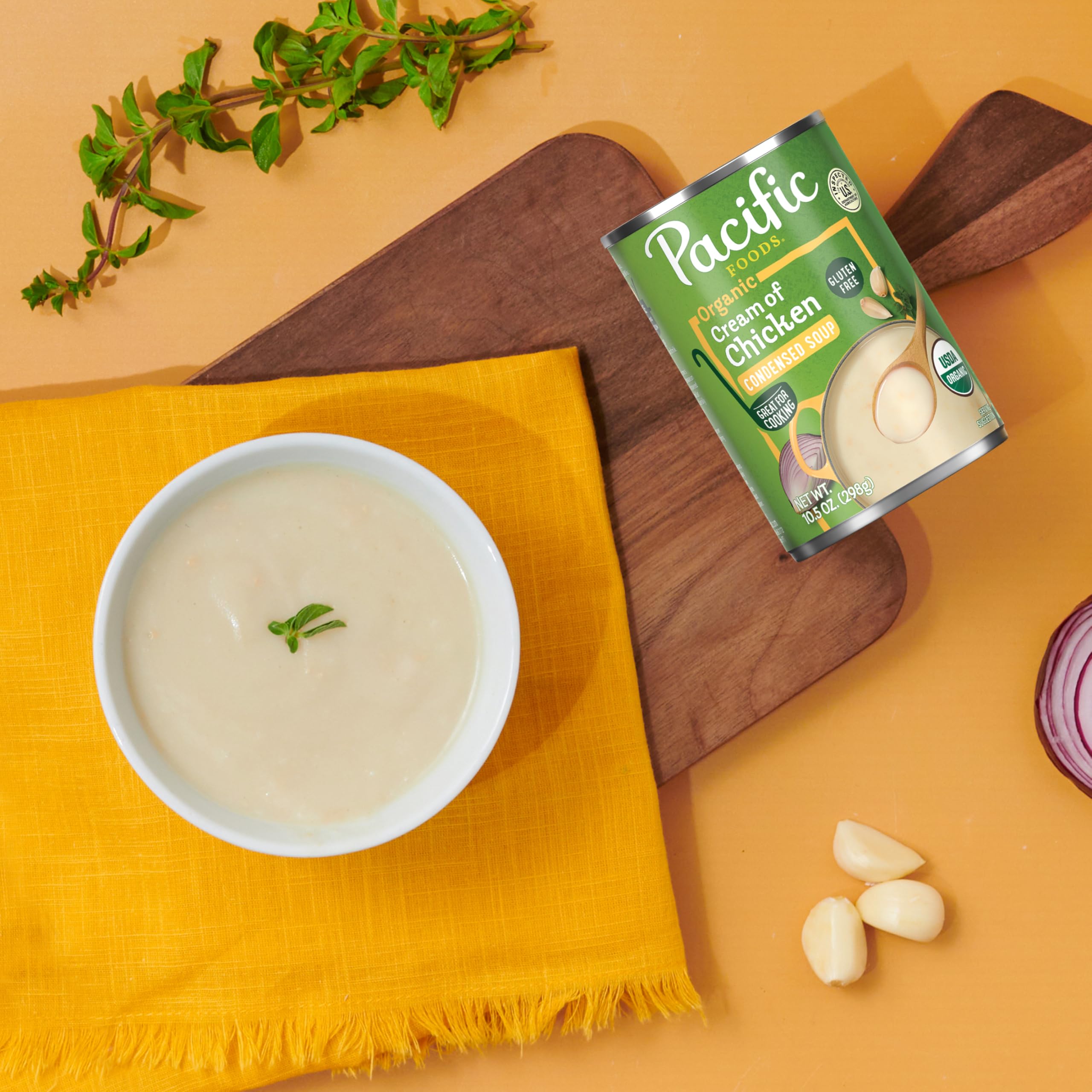Stovetop scene heating Pacific Foods soup for quick heat and serve