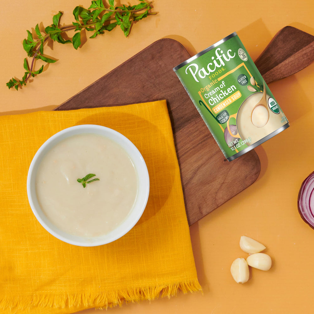 Stovetop scene heating Pacific Foods soup for quick heat and serve