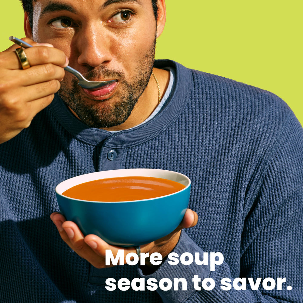 Bowl of Pacific Foods Creamy Tomato Soup served hot for a cozy meal.