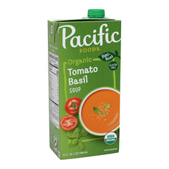 Pacific Foods Organic Tomato Basil Soup carton on a kitchen counter, convenient pantry staple.