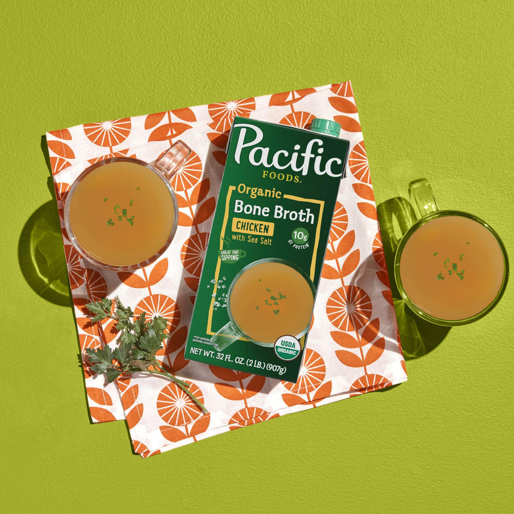 Pacific Foods bone broth in a steaming cup demonstrates a warm, protein-rich sip