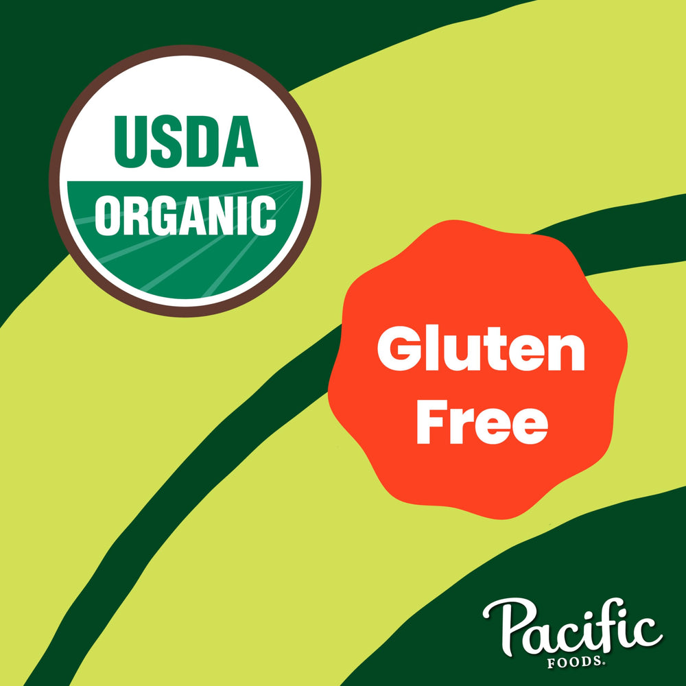 Spoon of Pacific Foods Organic Poblano Corn Chowder reveals hearty ingredients