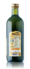 Paesanol olive oil close-up highlights bright green hues and cloudy texture.
